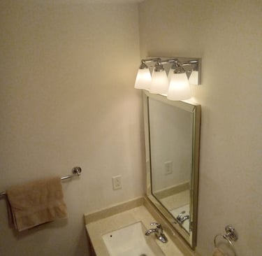 1/2 bath vanity sink and mirror lighting