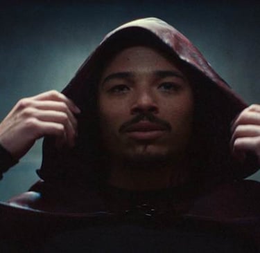 a man in a hoodie with a hoodie on