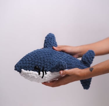 chonky shark plushie from Munnsense Gift Shop