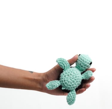 smol turtle plushie from Munnsense Gift Shop