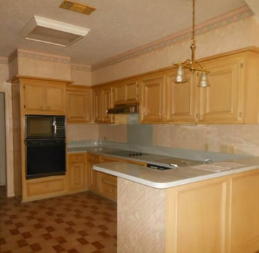 a kitchen with a stove top oven and a stove top oven