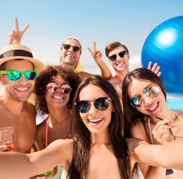 Group of friends enjoying a private Vegas dayclub tour with drinks and poolside fun
