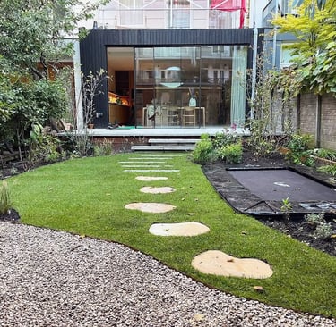 a garden with stepping stones and stepping stones