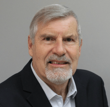 a man with a beard and a white shirt