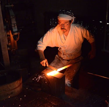 Japanese Blacksmith forging a katana