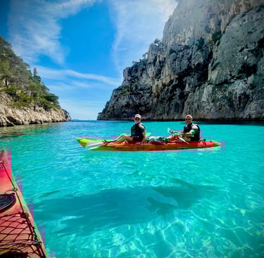 Sea kayak in cristal clear waters in Calanques Cassi