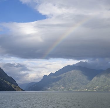 Sognefjord with clouds and rainbow Norway