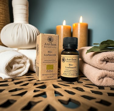 a box and a bottle of bay laurel essential oil sitting on a table