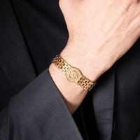 a man wearing stylish bracelets