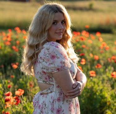 senior photo in flower field