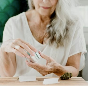 a woman in a white shirt is holding a piece of food