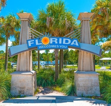 a welcome sign for the florida beach club