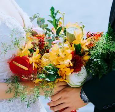 Wedding couple with a bouquet of flowers