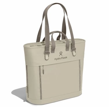 Hydro Flask insulated soft cooler tote bag in tan birch with shoulder straps for picnics and travel.