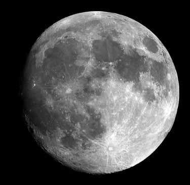 a clear large image of the moon illuminated against a black universe