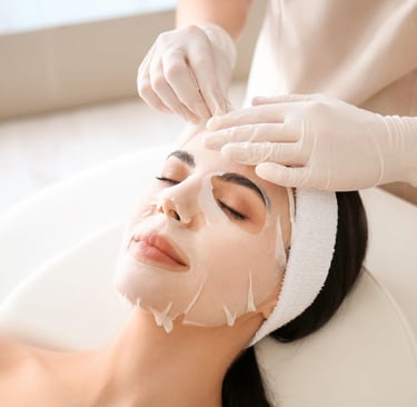 woman receiving a facial treatment