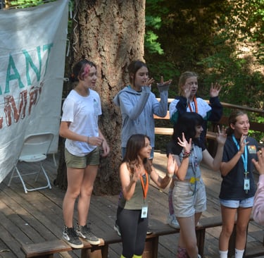 a group of people leading chapel songs