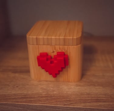 a wooden block heart shaped puzzle box glovebox