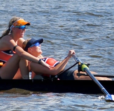 Anna and Maija Andert resting and basking after taking gold at AYC