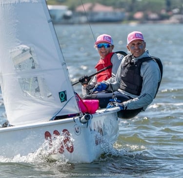 Maija Andert sailing the Melges 15 with dad crewing
