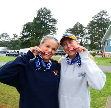 Maija and Anna showing off their bronze medals at SE Regionals