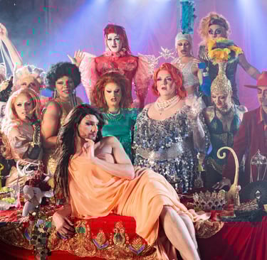 a group of drag queens dressed in costumes and costumes