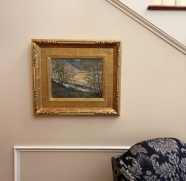 a painting of the french countryside on a wall