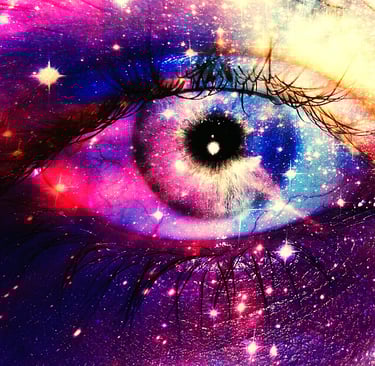 a person's eye looking at a galaxy - like eye