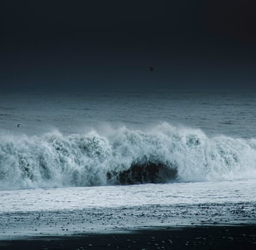 huge wave hitting the coast