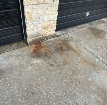 Battery Acid Rust Stains at Automotive Repair Shop