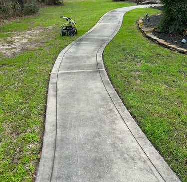 Sidewalk before pressure washing