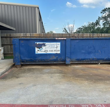 Dumpster with Rust and Dirt Stains