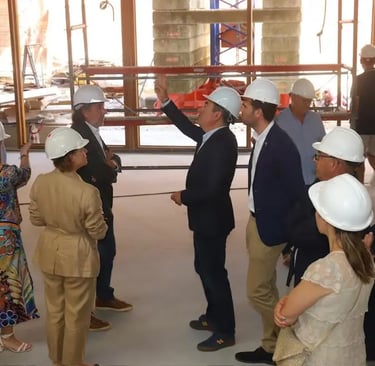 Agthia group's executives standing around a building, where the company Reports Strong Financial Gr