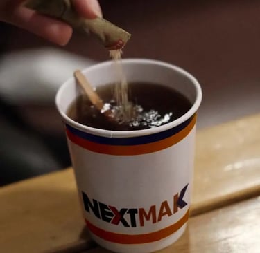 Purring sugar into tea cup 