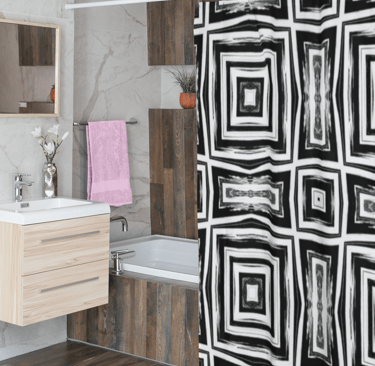 Bathroom with bath a shower curtain hanging partially close in front of the bath
