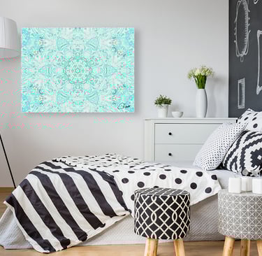 Digital image featuring a kaleidoscope design on a canvas prints handing on a bedroom wall.