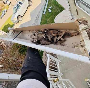 Exterior gutter repair project restoring proper water flow and preventing foundation damage in Calgary.