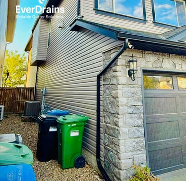 Seamless aluminum gutters installed for home water drainage protection