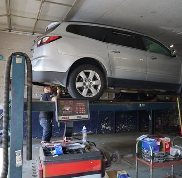 Savios inspecting a vehicle for a customer
