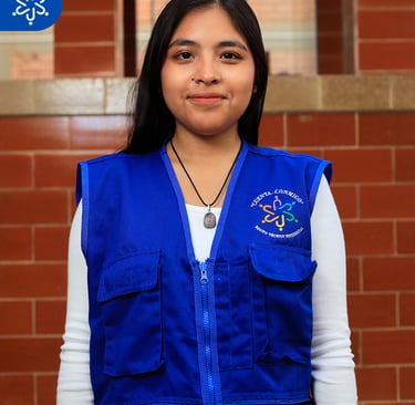 a woman in a blue vest and white shirt