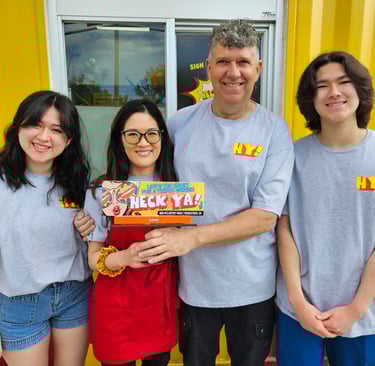 HeckYA owners Billy & Yukari West with kids at their Youngstown Ohio drive-through restaurant