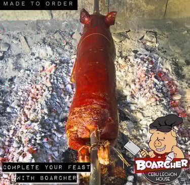 cebu lechon on a bed of charcoals