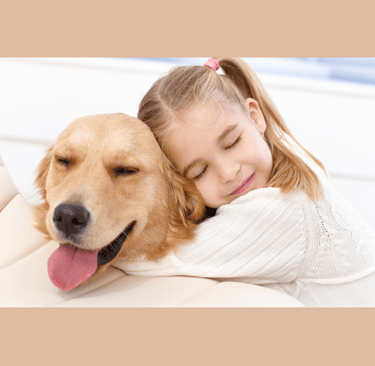 a girl with her golden retriever