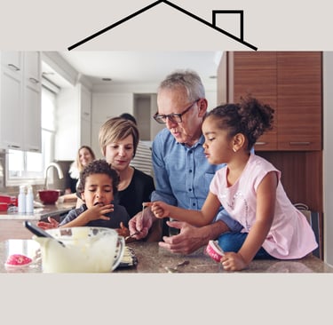 Elders and children cooking together with parents watching