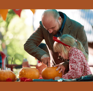 Carving pumpkins together