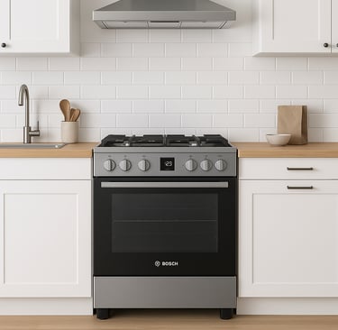 Bosch gas stove in a modern kitchen with white cabinets and wood countertop.