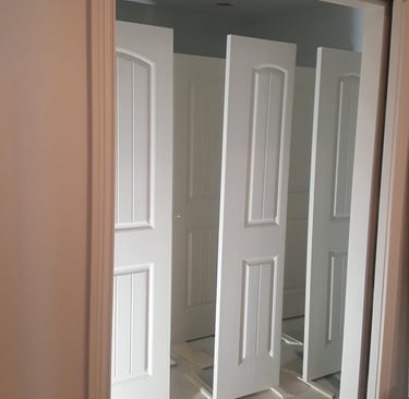 American Painting Specialist Fort Wayne, Indiana freshly spray painted doors.