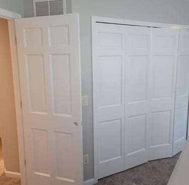 American Painting Specialist Fort Wayne, Indiana White spray painted doors.