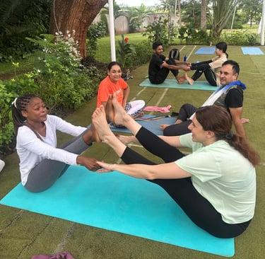 a partners pose during yoga session for strength and flexibility