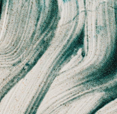 background image - teal glitters spreaded artistically on a white surface